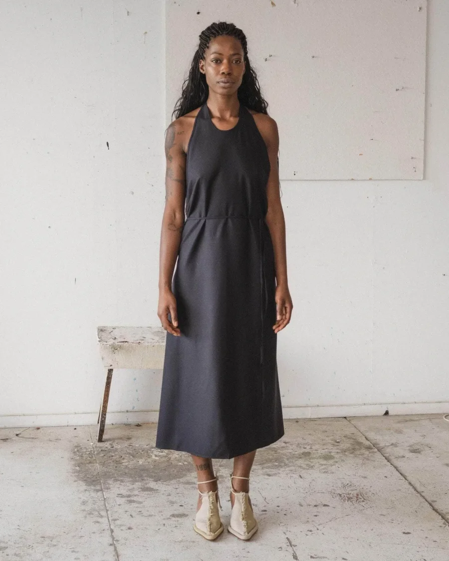 Baserange Apron Dress Black front view on model