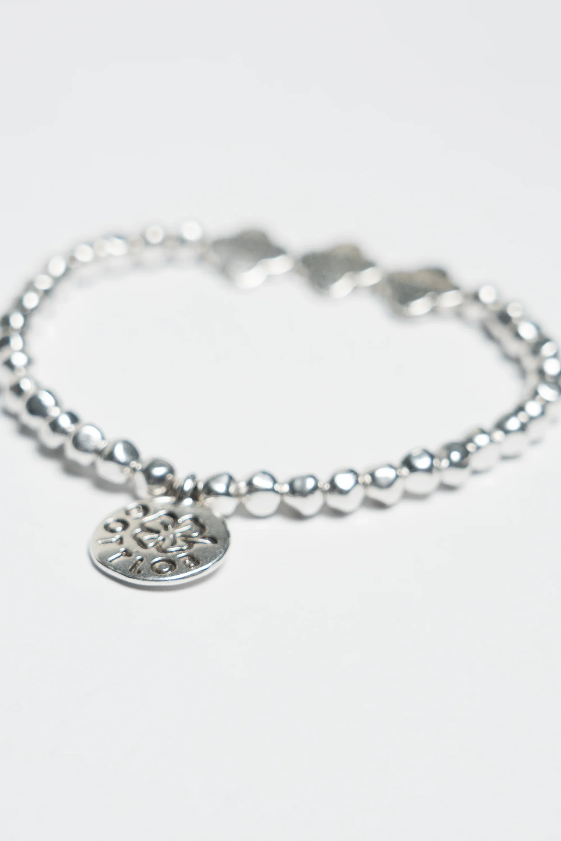 Gottlob Edition No. 4 Bracelet in a grey background