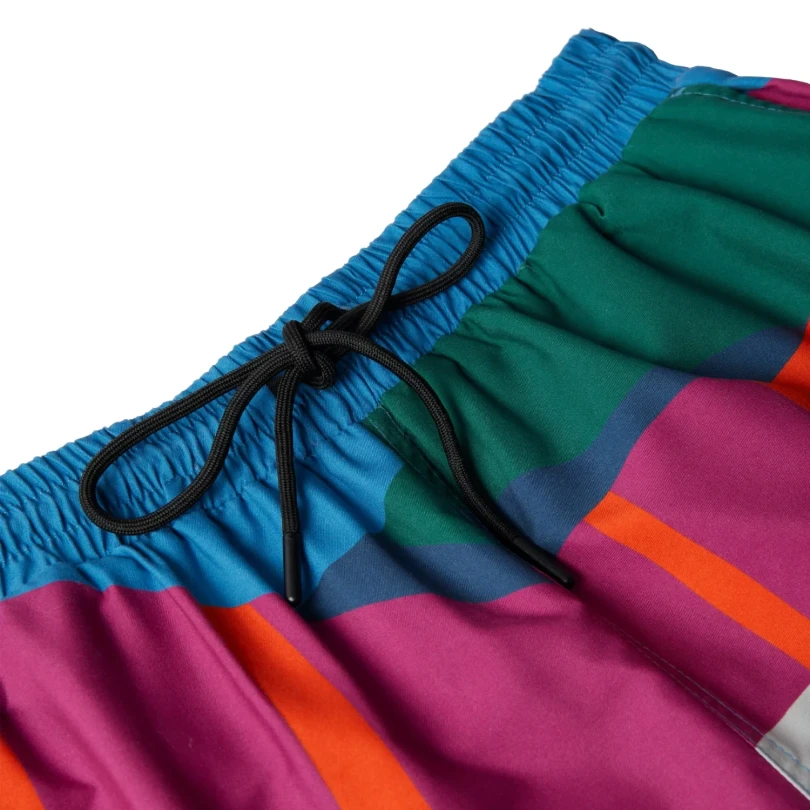The Festival Fence Swim Shorts front view detail in a white background