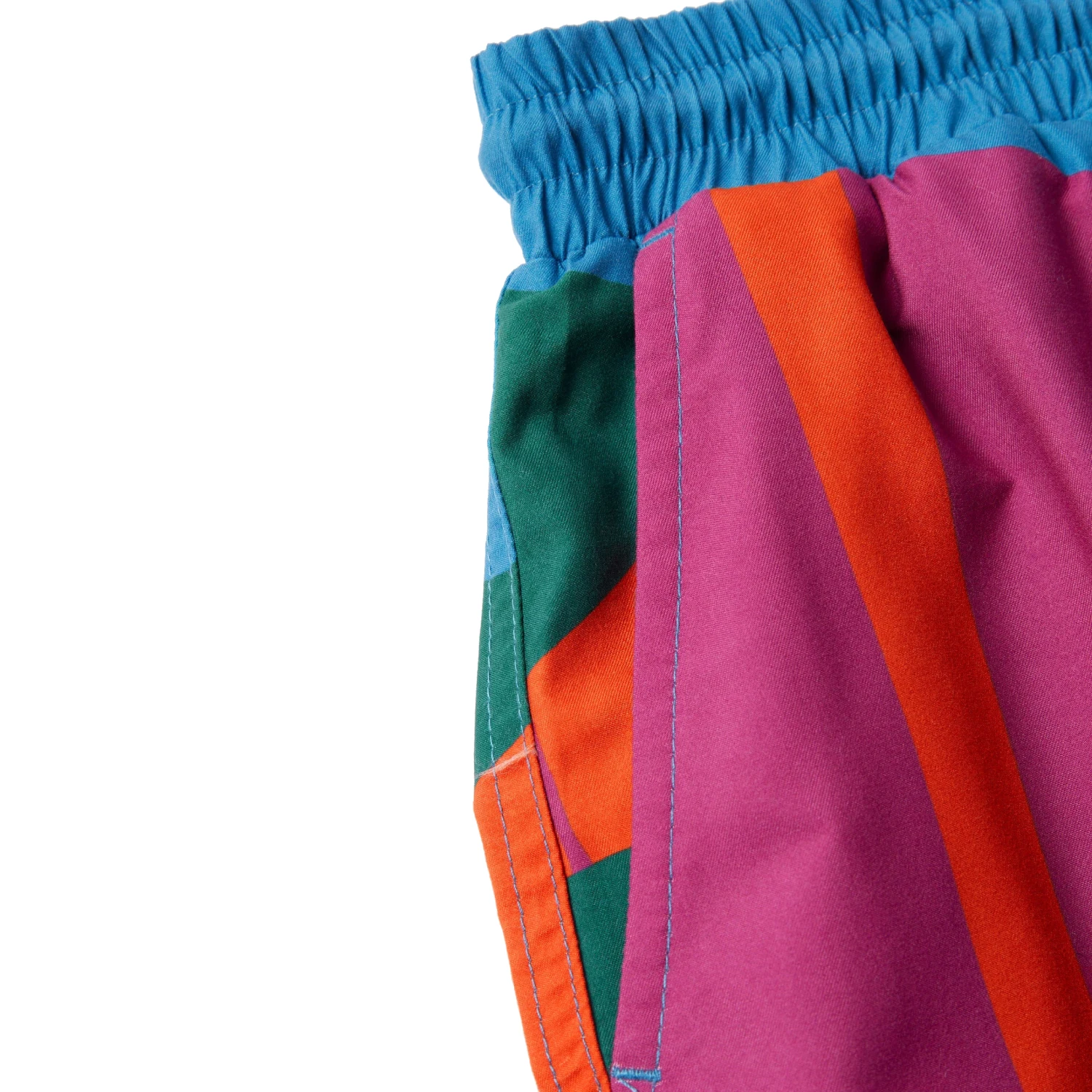 The Festival Fence Swim Shorts front view pocket detail in a white background