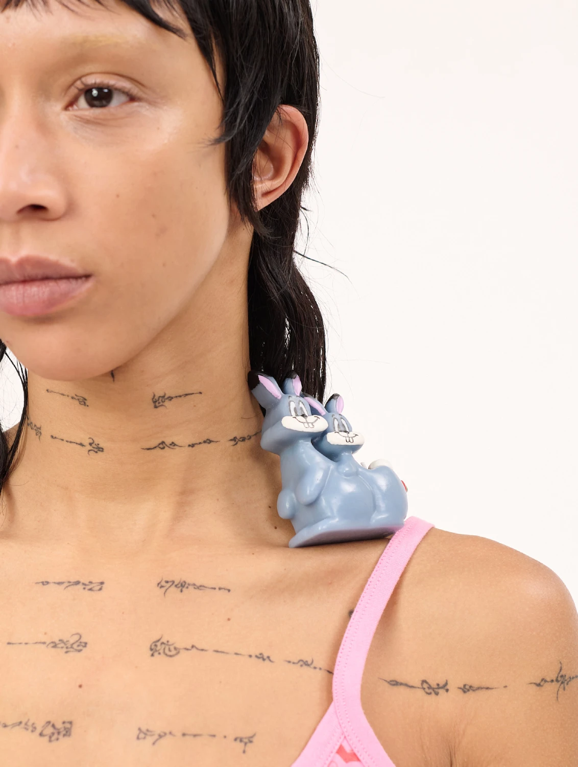 Carne Bollente Rabbits by Olga Goose Candles front view with model