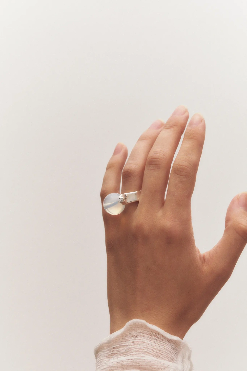 Simuero Lira Ring Silver/White top view on model