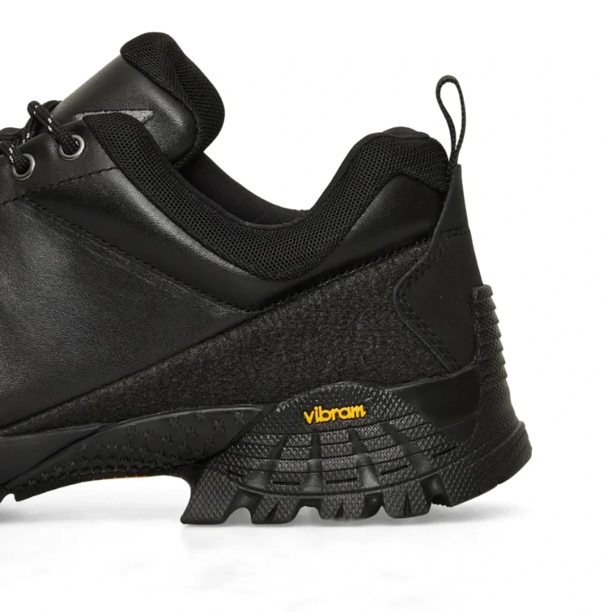 ROA Neal Black side view detail in a white background