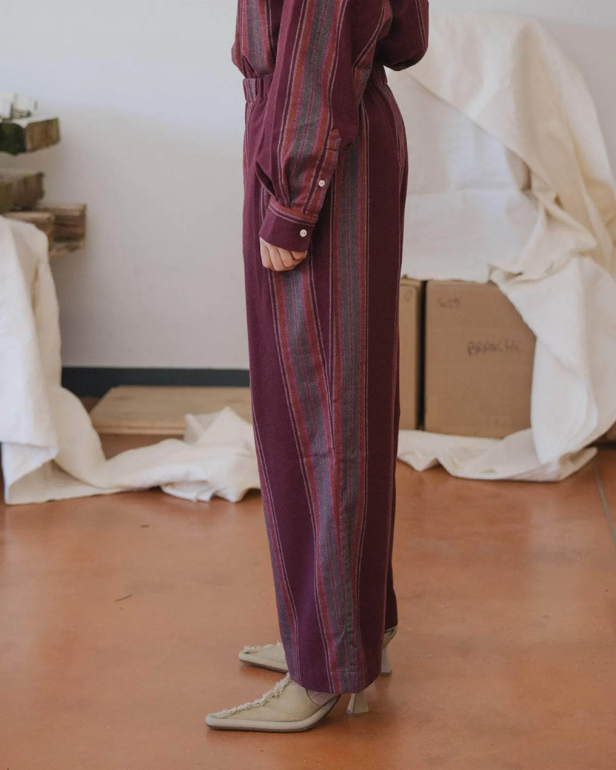 Baserange Claude Pants Maroon Stripe side view on model