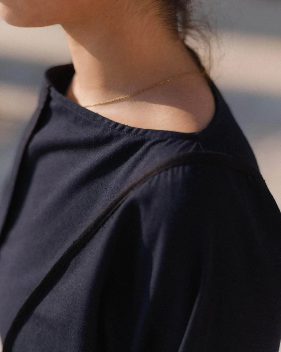 Baserange Nika Dress Dama Navy side view detail on model