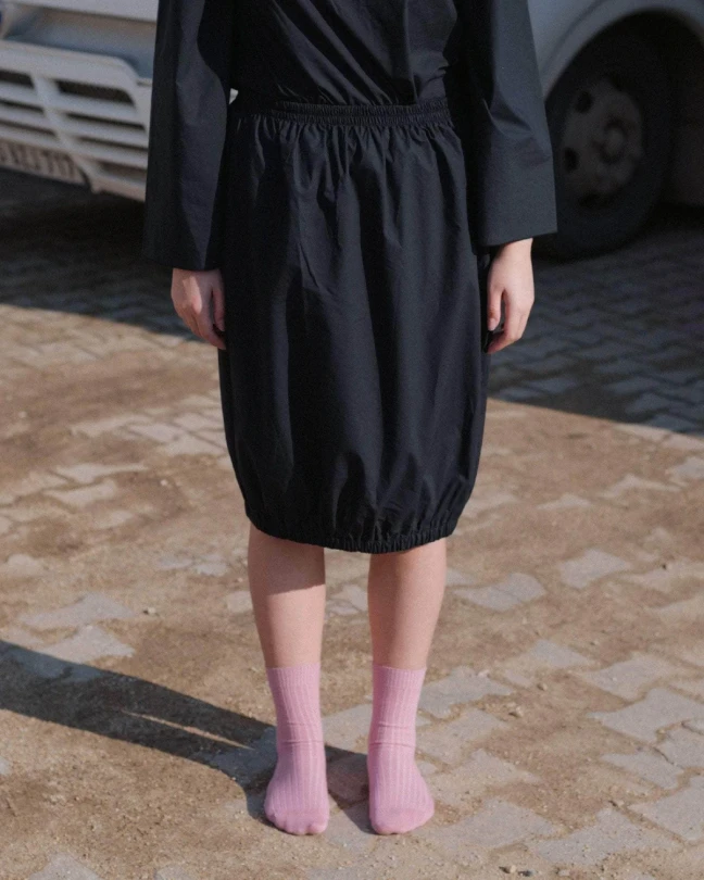 Baserange Simmon Skirt Black front view on model