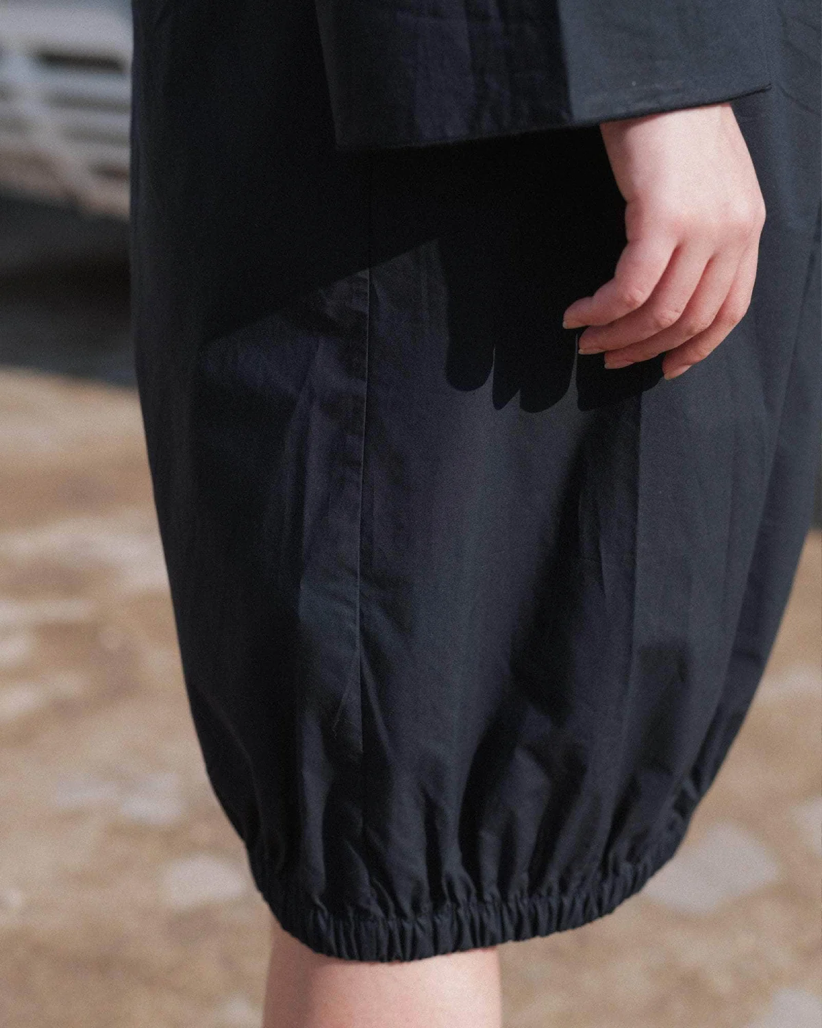 Baserange Simmon Skirt Black side view detail on model