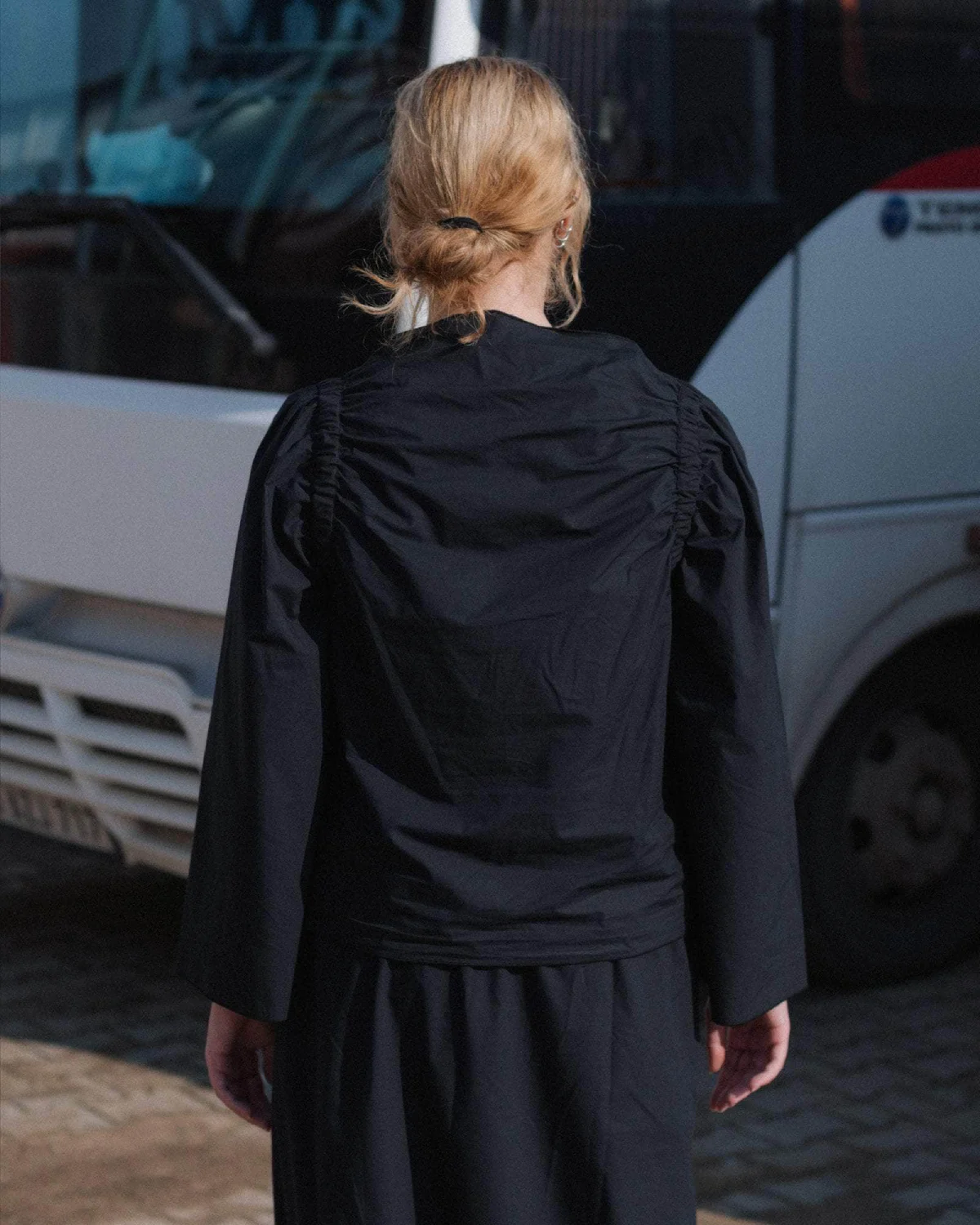 Baserange Simmon Top Black back view on model