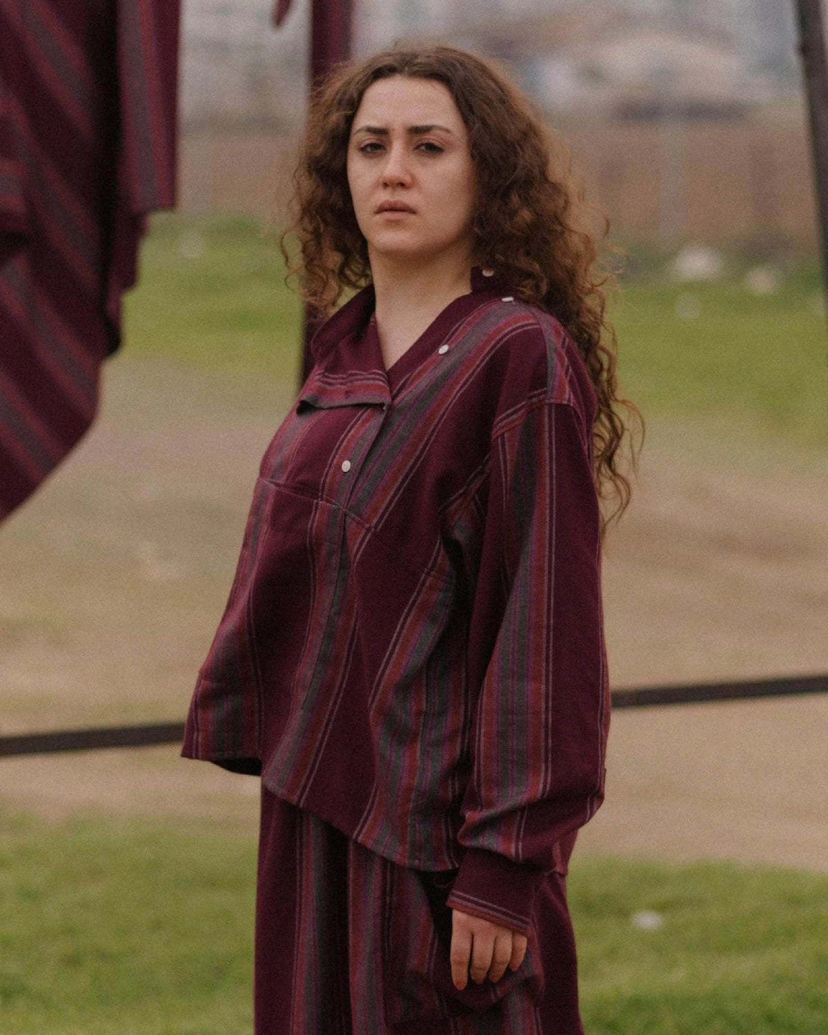 Baserange Snell Shirt Maroon Stripe side view on model