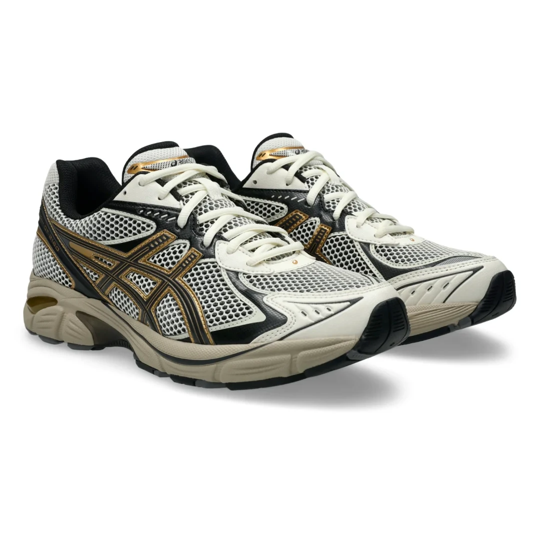 Asics GT-2160 Cream/Pure Gold side view in a white background