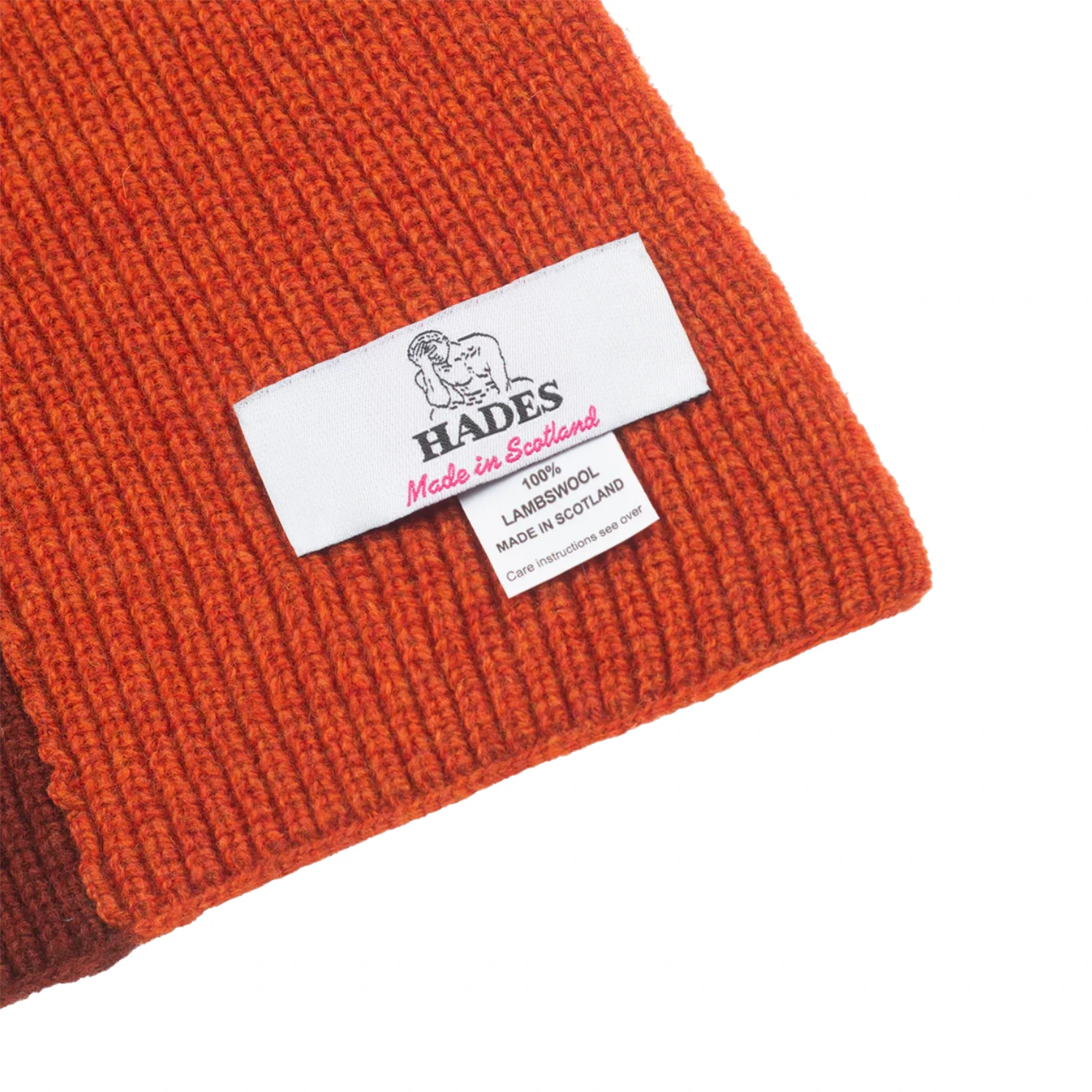 Hades Wool Hooded Scarf Forest Green tag detail in a white background