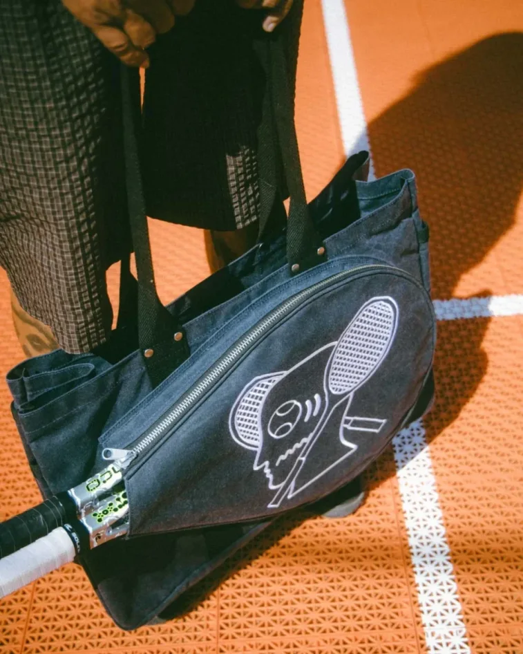 Brain Dead Equipment Waxed Canvas Tennis Tote Navy front view on model