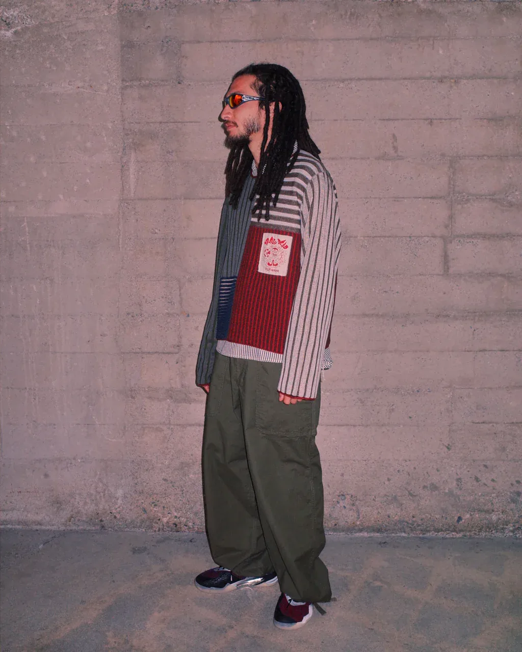 Brain Dead Mixed Stripe Boxy Knit Sweater Green Multi front view on model