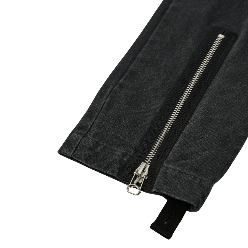 OAMC Peacemaker Flight Pant Black hem detail in a white background