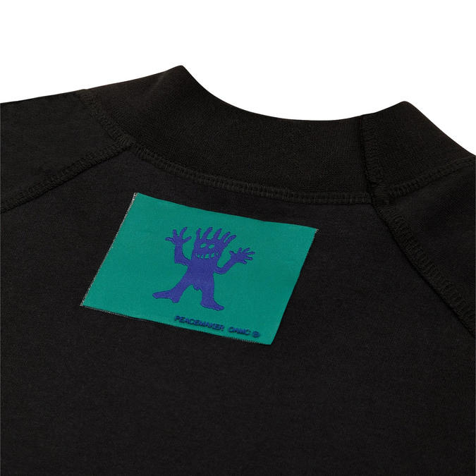 OAMC Peacemaker Jersey Combat T-Shirt Black back view detail in a white background