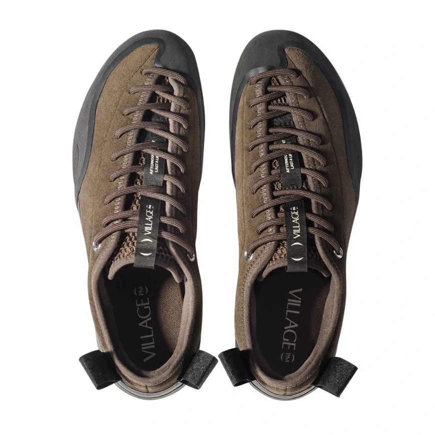 Village PM 1PM Chocolate top view in a white background