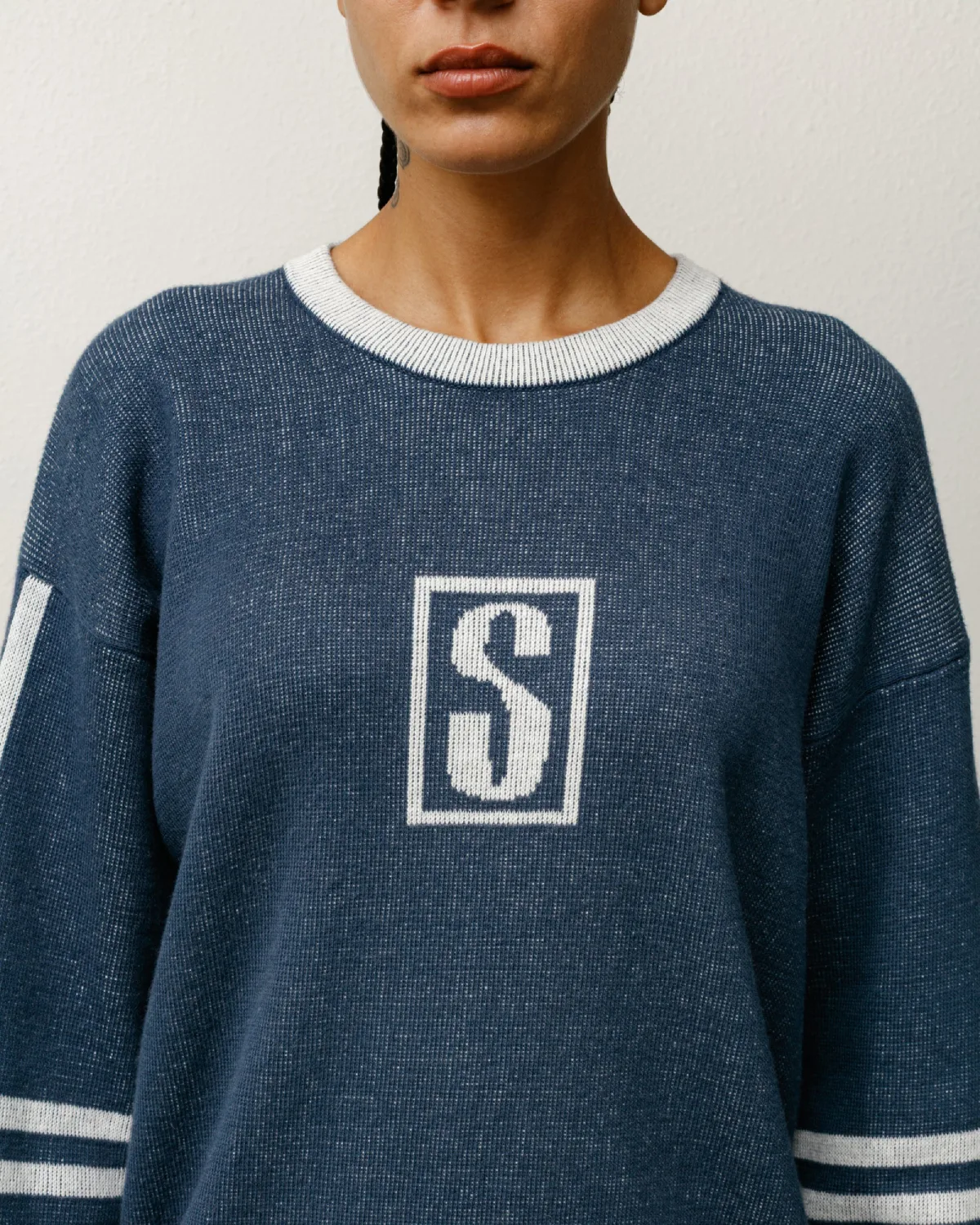 Stüssy Alpine Sweater Blue front view detail on model