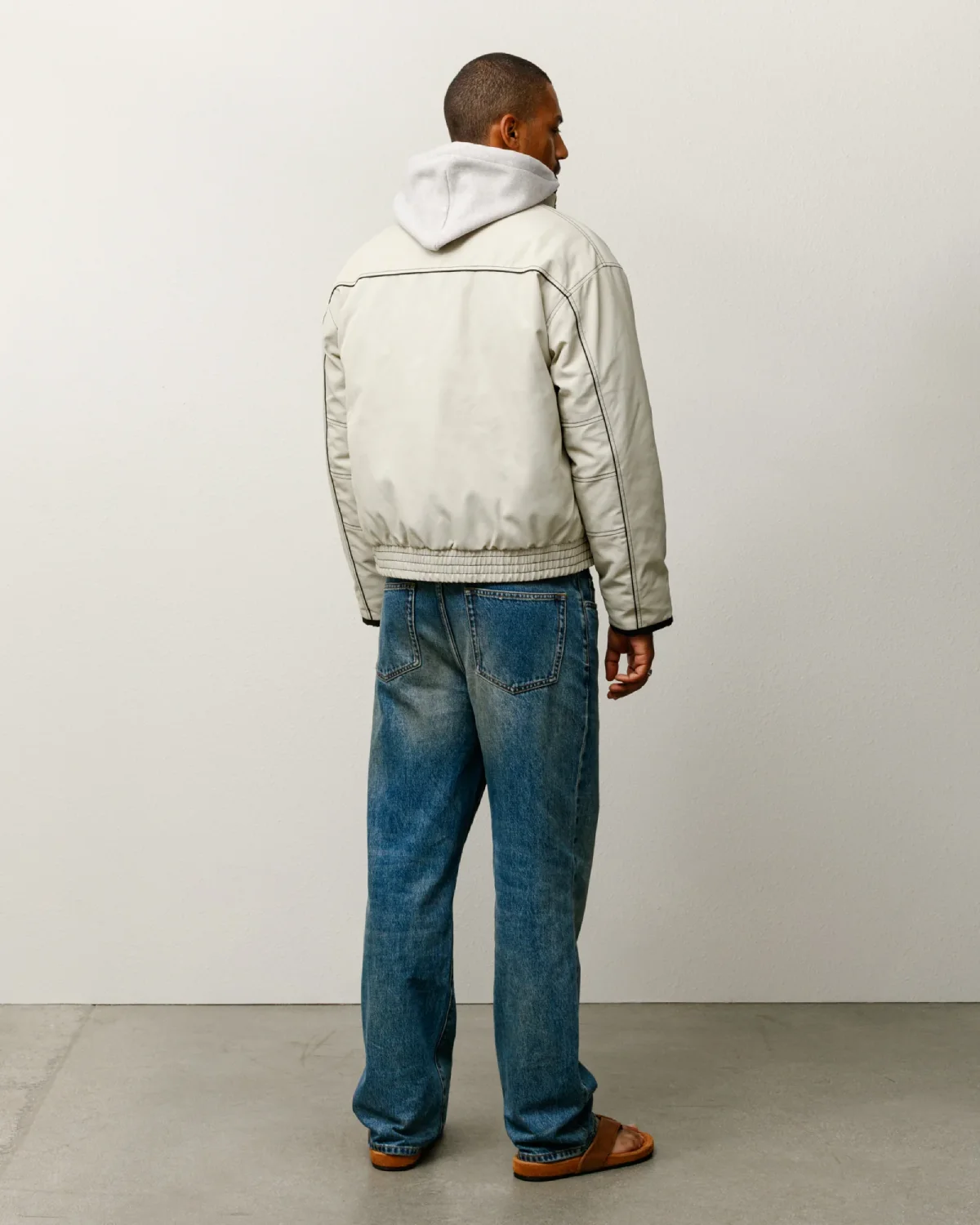 Stüssy Insulated Built Jacket Sand back view on model