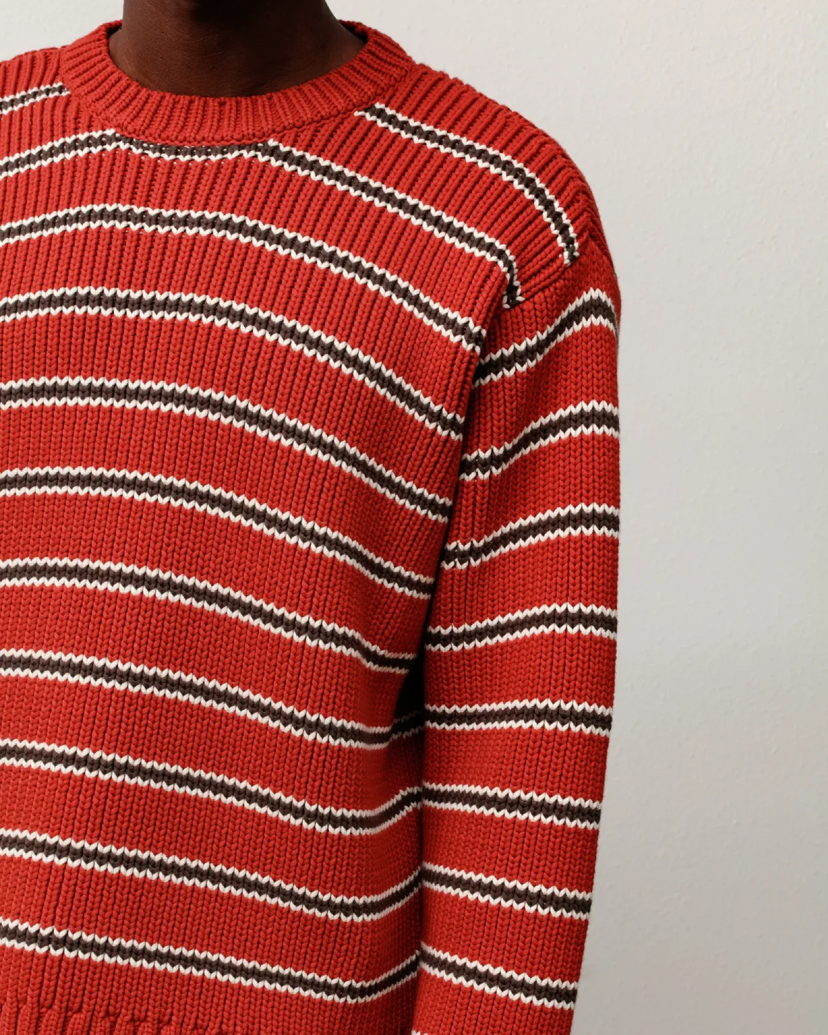 Stüssy Stripe Knit Crew Brick front detail view on model