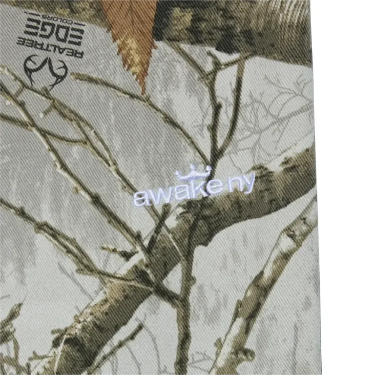 Awake NY Real Tree Denim Pant front view detail in a white background