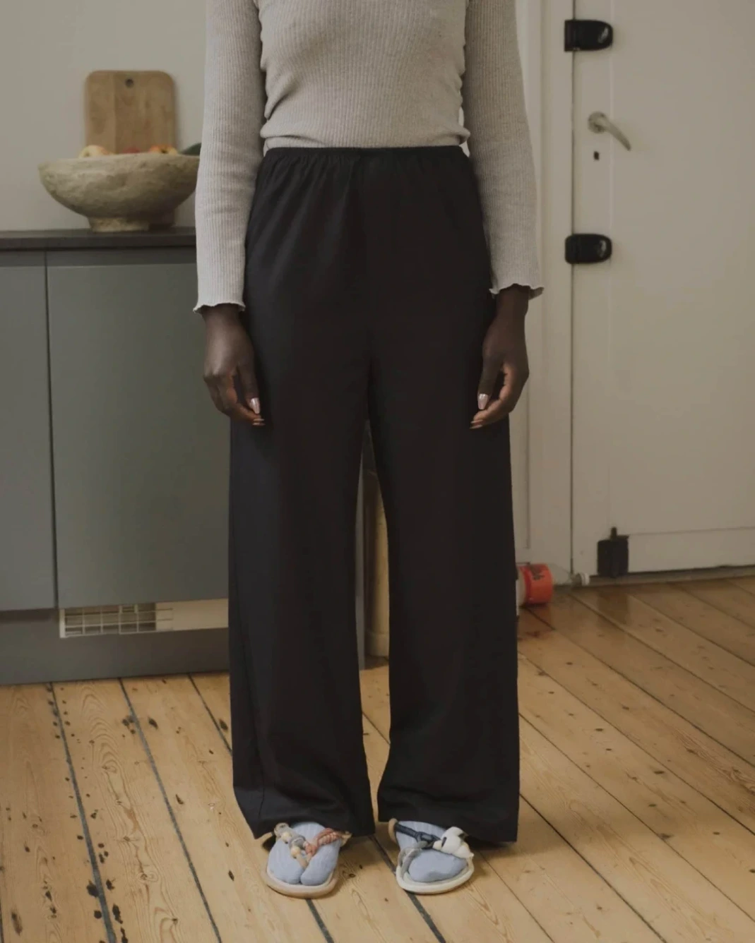 Baserange Stoa Pants Black front view on model