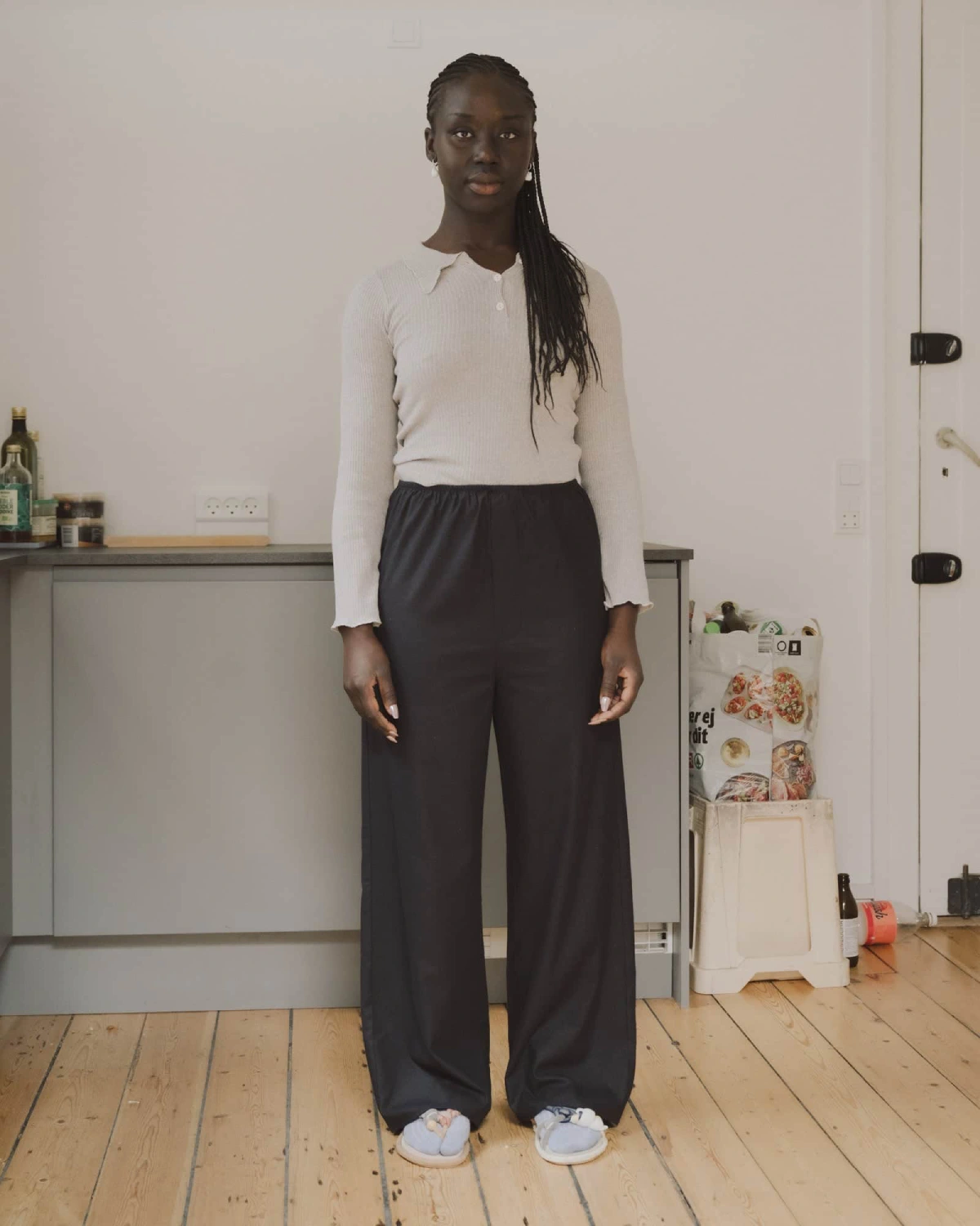 Baserange Stoa Pants Black front view on model