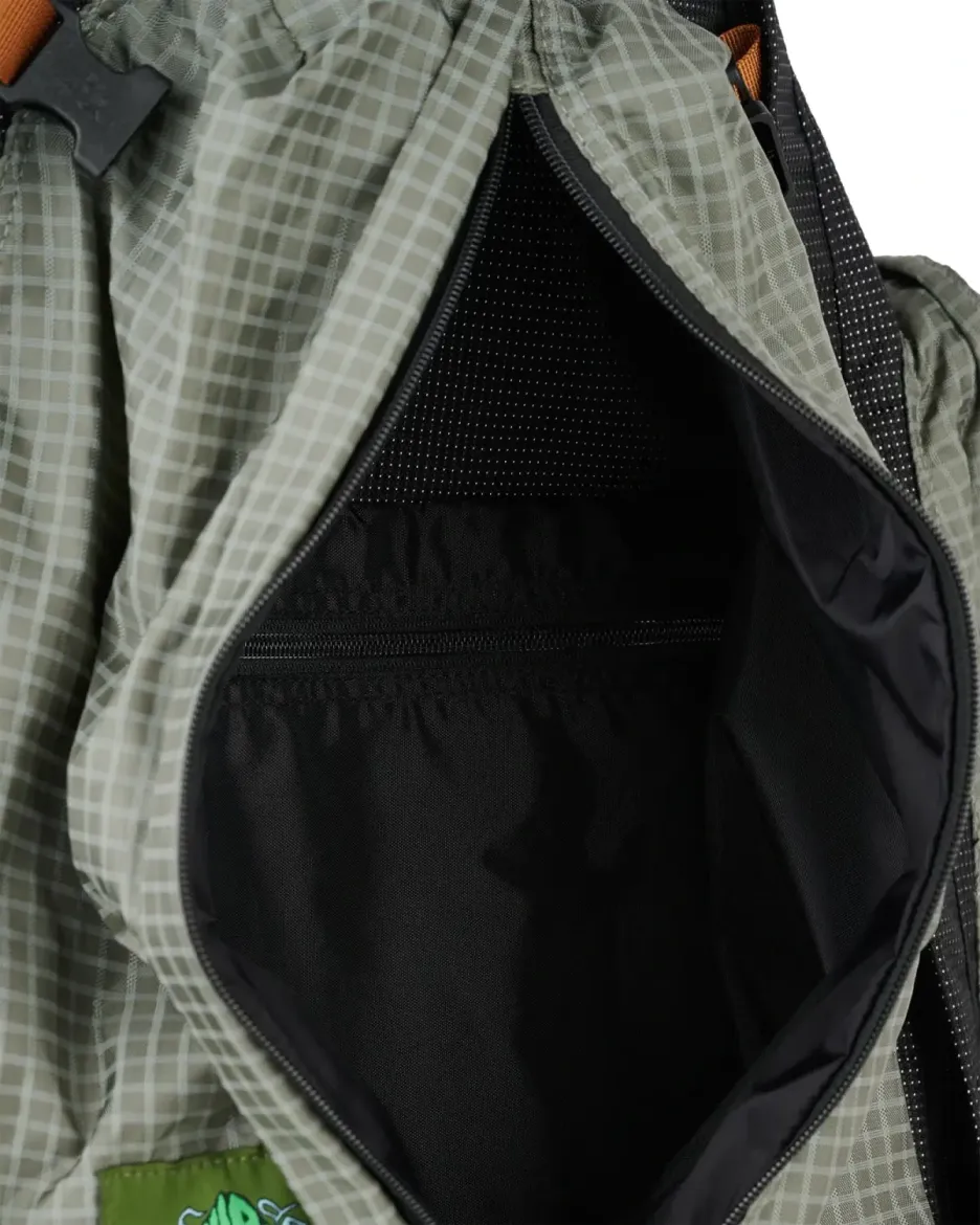 Brain Dead Alpine Backpack Black pocket detail in a white background