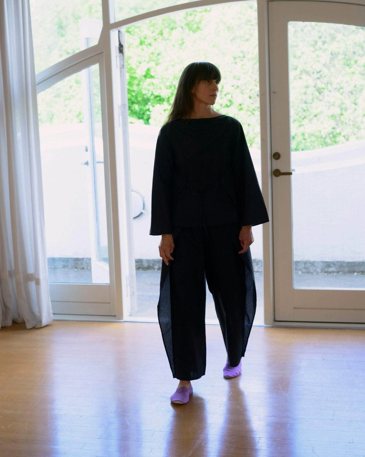 Baserange Decti Pants Black front view on model