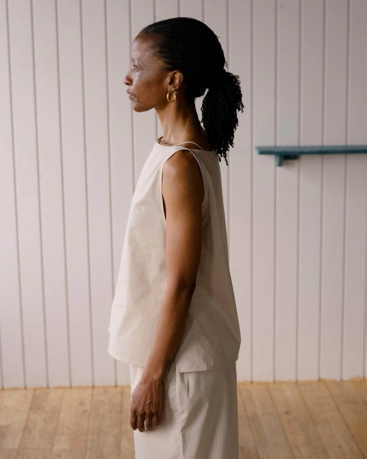 Baserange Decti Top Brown Stripe side view on model