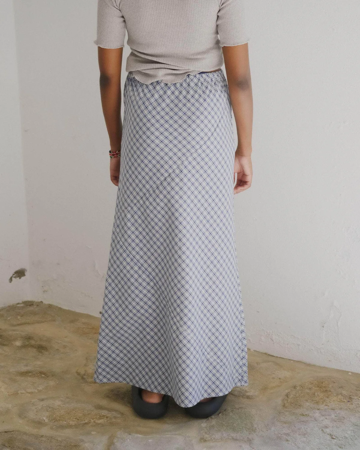 Baserange Larva Skirt Blue Check back view on model