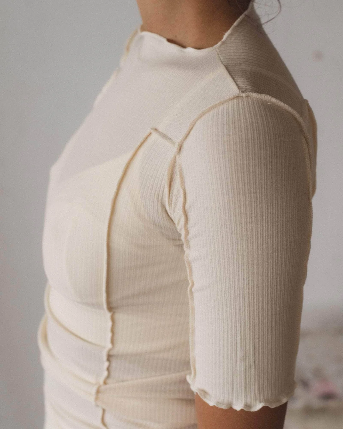 Baserange Omato 3/4 Tee Shirt Off White side view detail on model