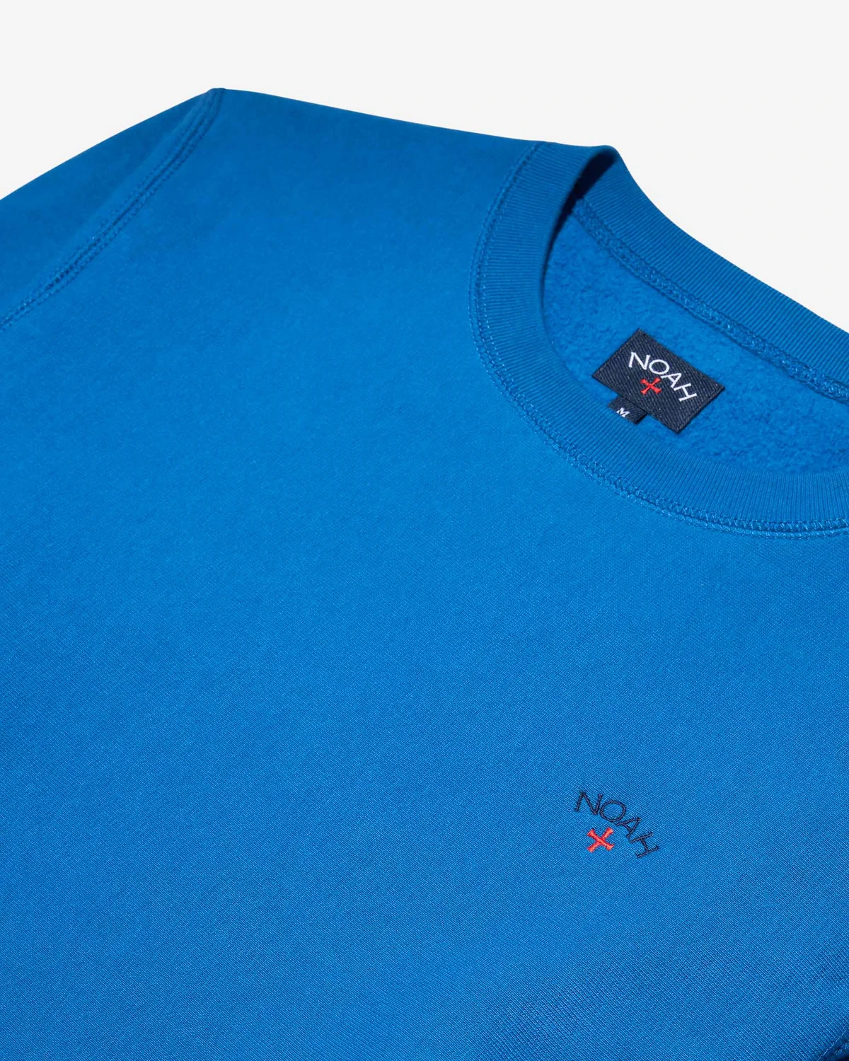 Noah Classic Crewneck Cobalt front view detail