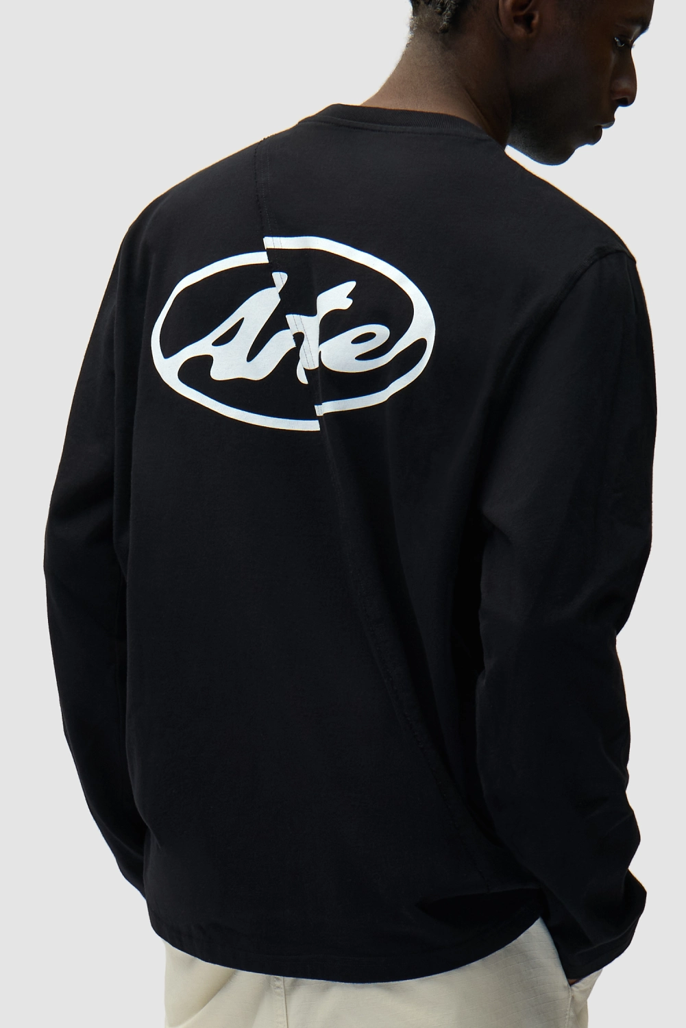 Arte Antwerp Back Circle Logo Longsleeve Black back view on model