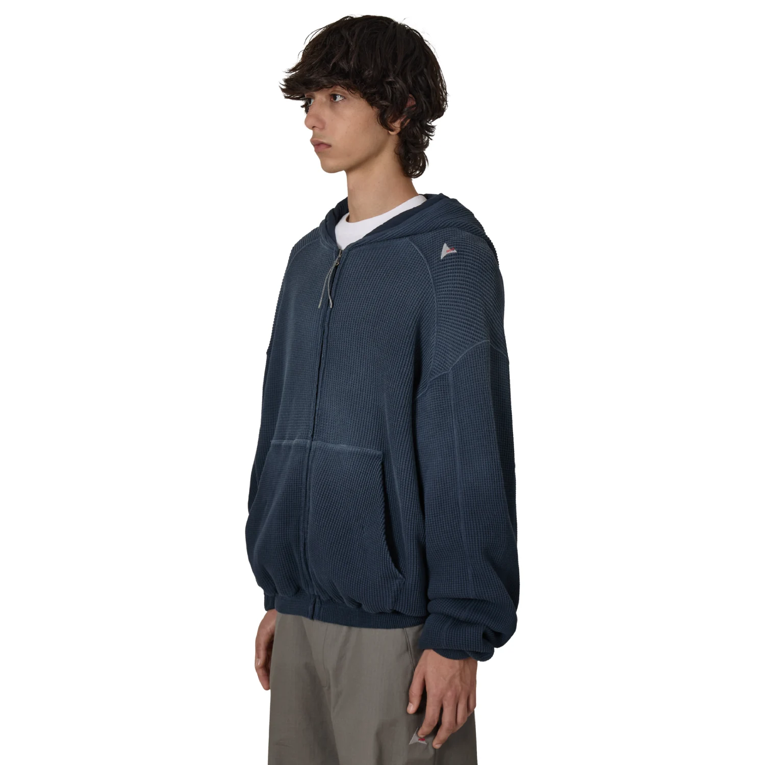 ROA Bee Sun Faded Organic Waffle Zip Up Hoodie Navy side view on model in a white background