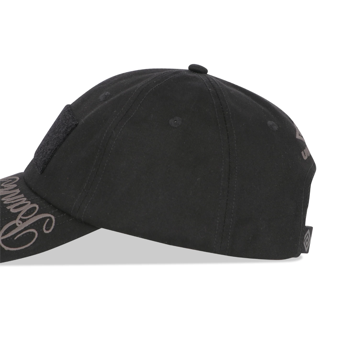 Umbro Slam Jam Hazard Cap Black side view in a white background