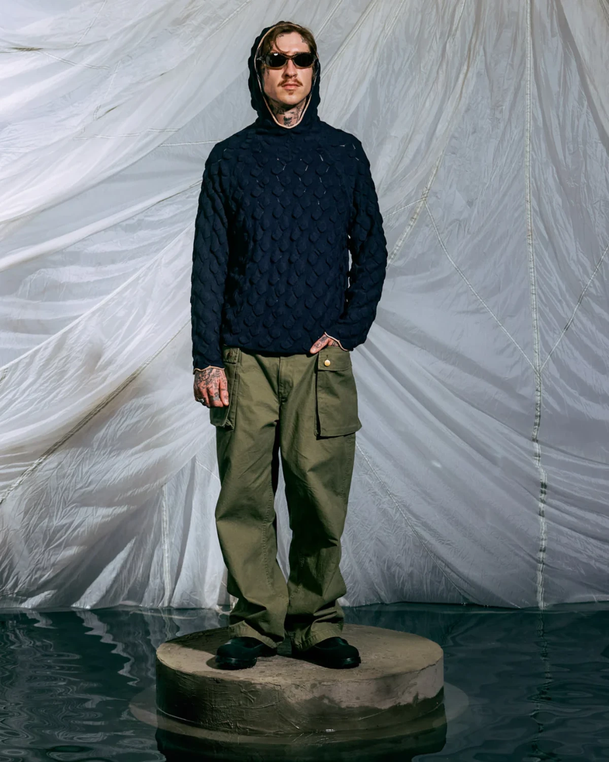 Brain Dead Bubble Knit Hoodie Midnight Blue front view on model