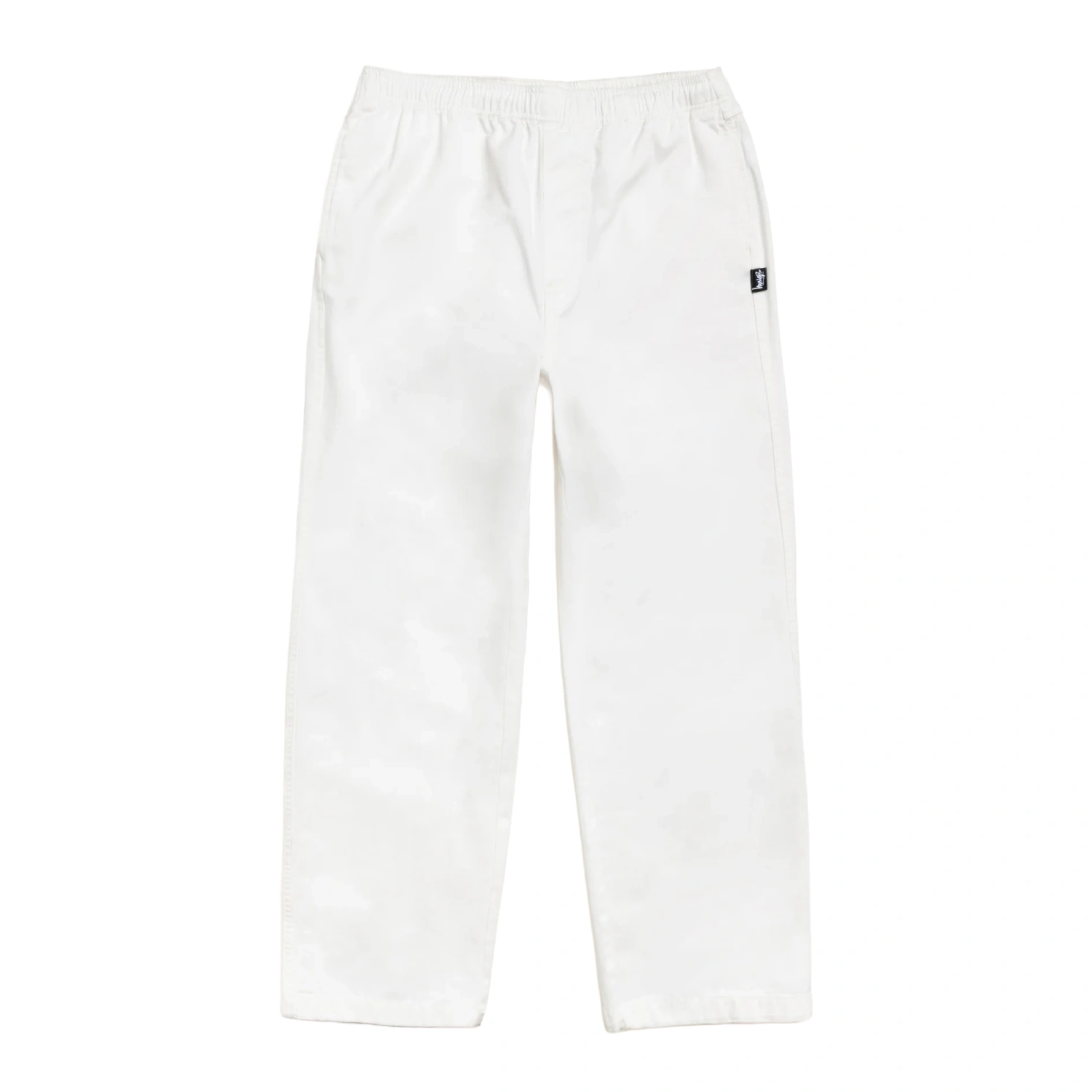 Stüssy Beach Pant Bone front view in a white background