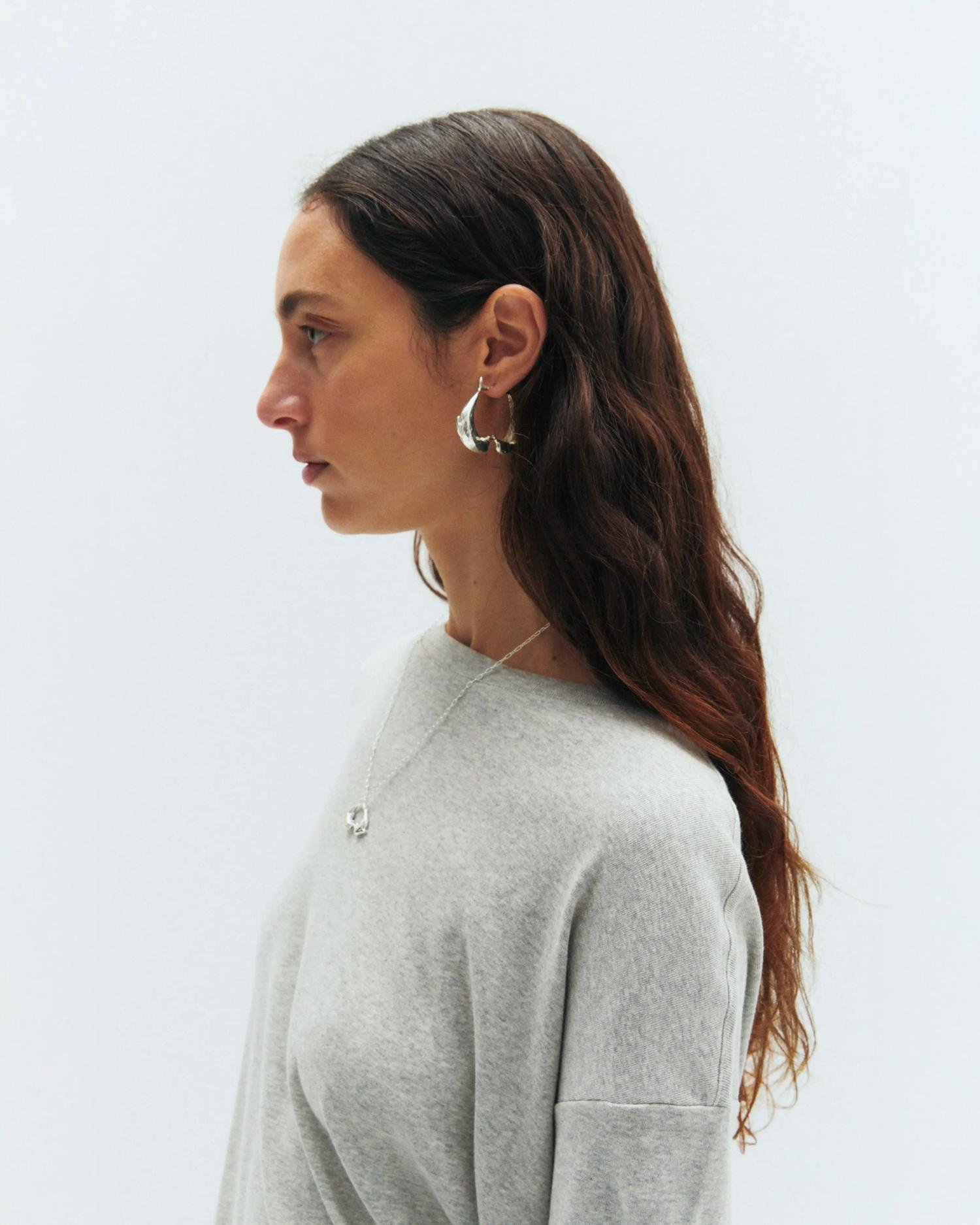 Simuero Los Delfines Hoop Earrings on model