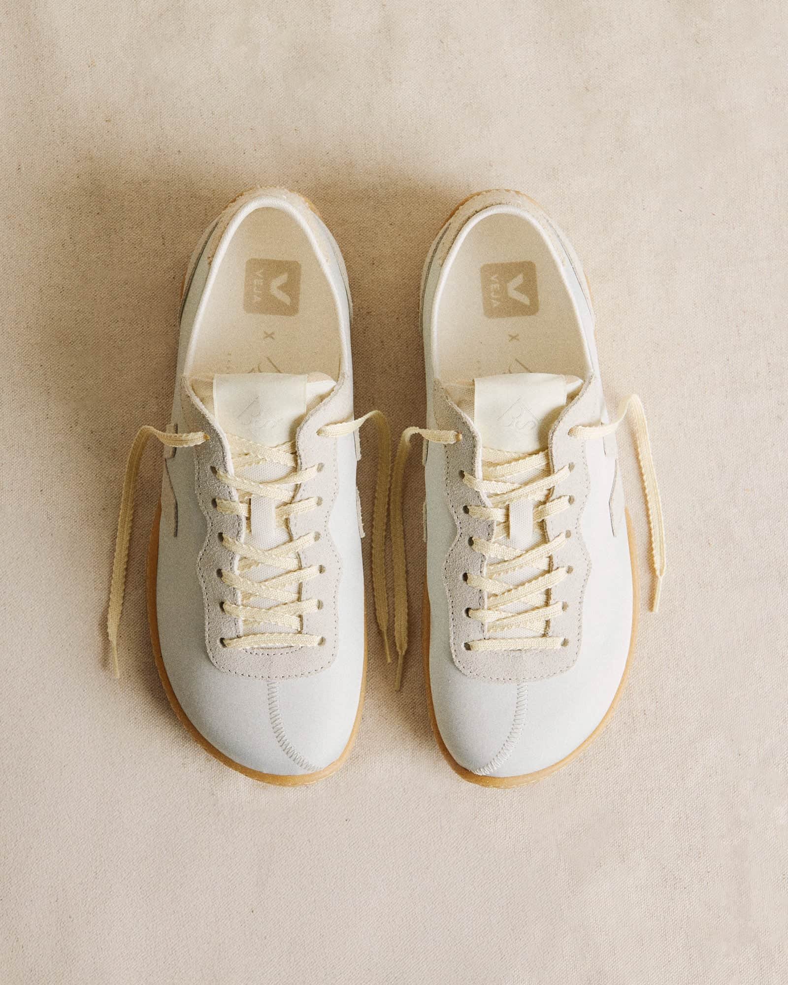 VEJA X Baserange Jitsu Nolyn Natural Grey in a beige background