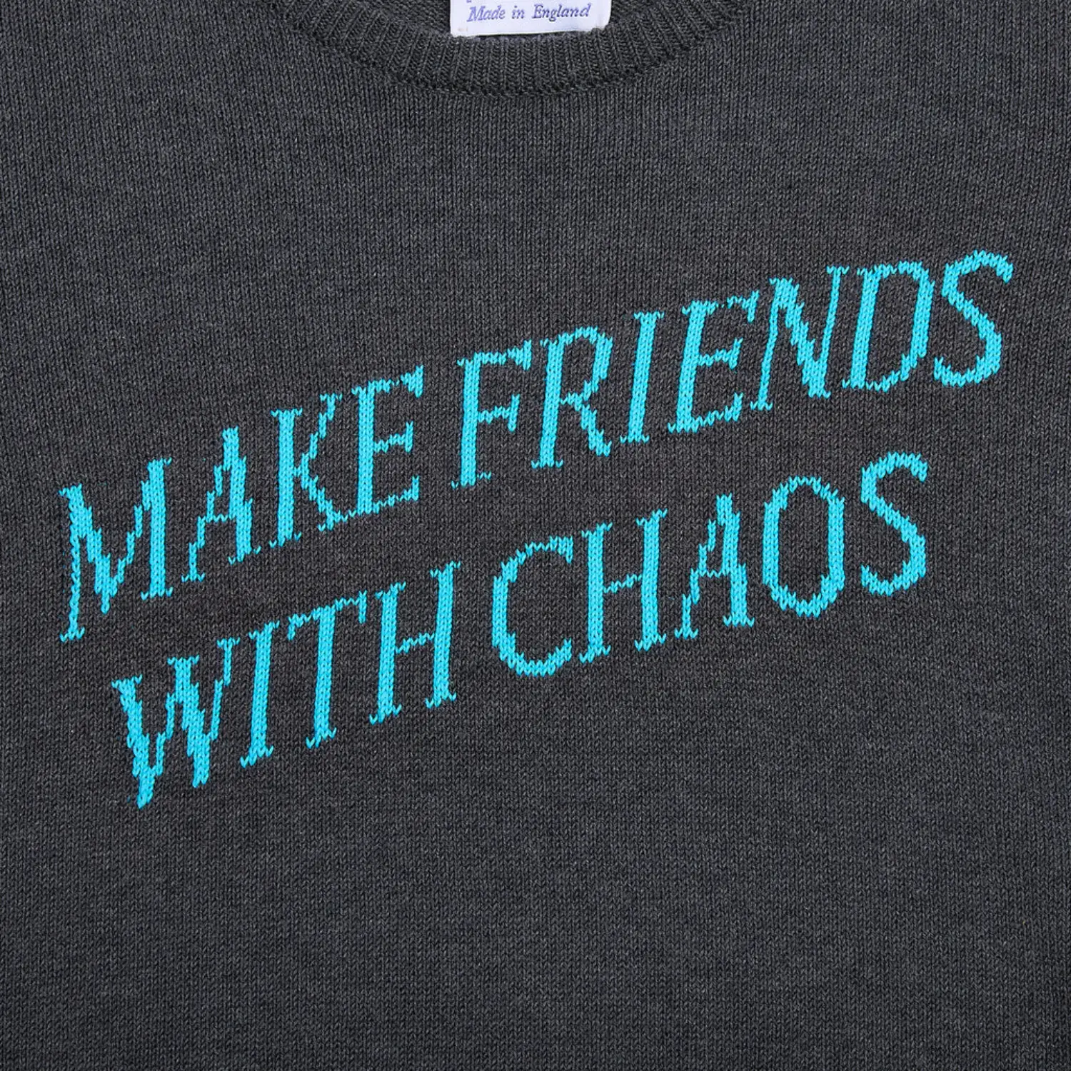 Hades Wool Make Friends With Chaos Jumper Grey front view in a white background