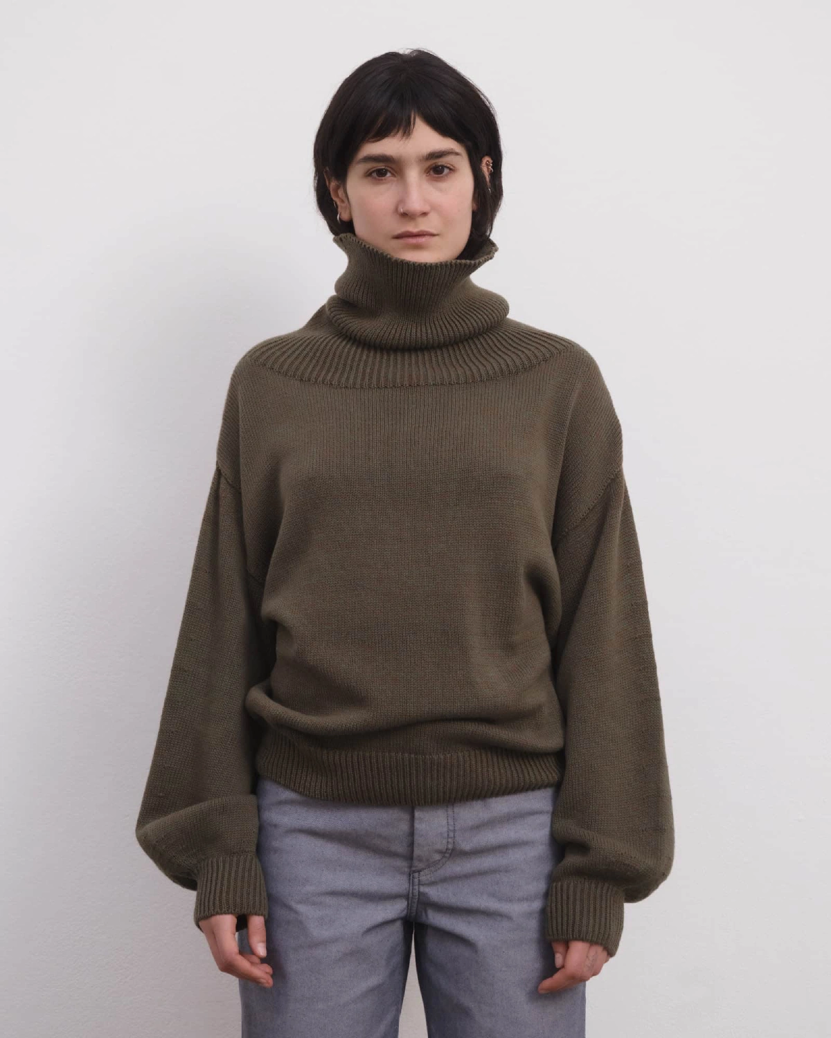 Baserange Calla Turtleneck Green Brown Melange front view on model