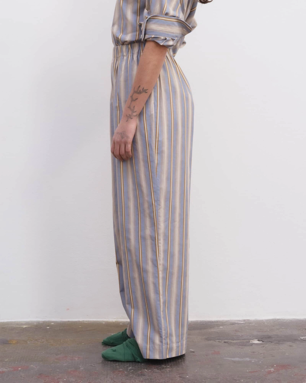 Baserange Claude Pants Grid Stripe side view on model