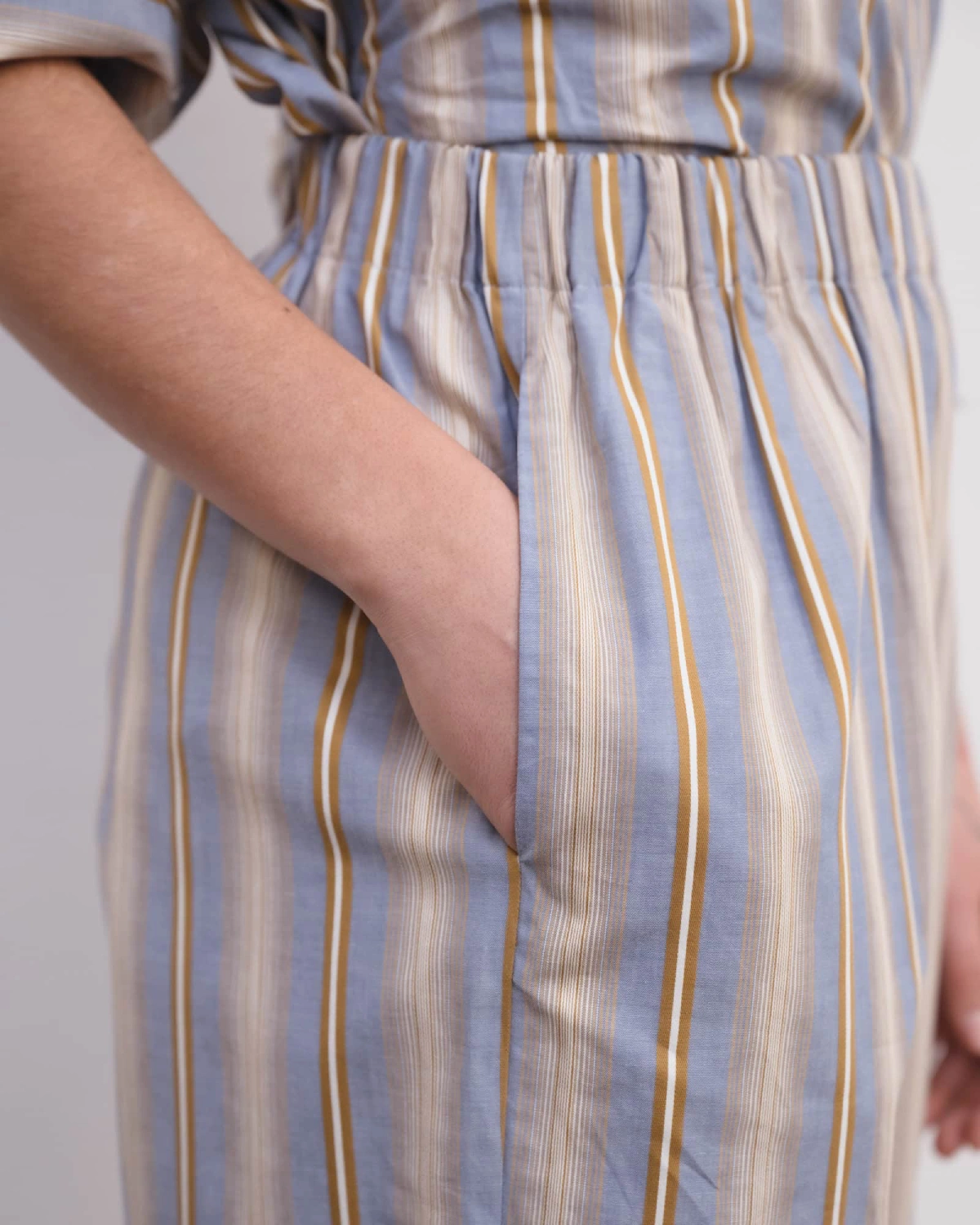 Baserange Claude Pants Grid Stripe side view on model
