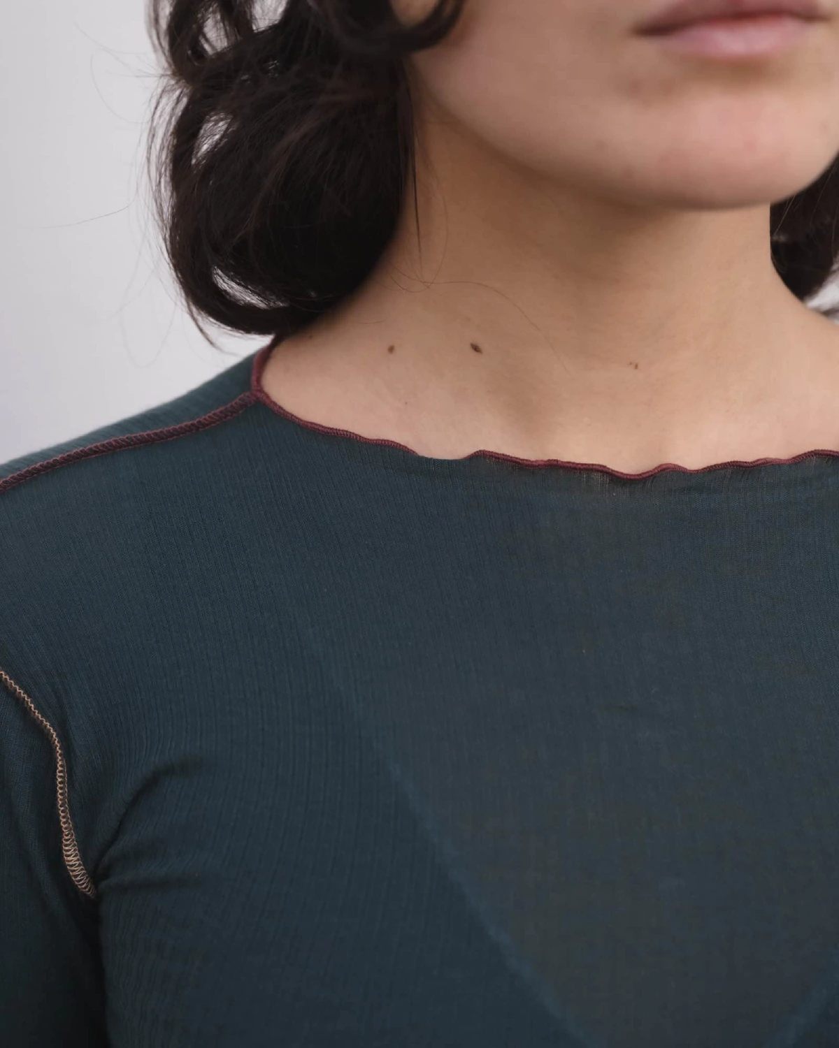 Baserange Vein Long Sleeve Tee Hirsu Green detail on model